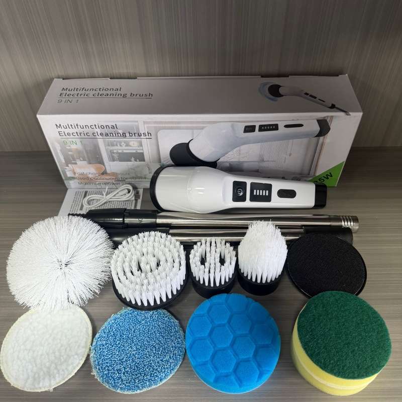 Electric scrubber kit with extension handle, brush heads, cleaning pads, and charging cable